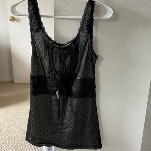 Black lace over white fabric tank top